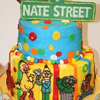 Nate's 2Nd Birthday I made this for Nate's 2nd Birthday. Buttercream icing with fondant decorations. The characters and sign are all chocolate transfer. I...
