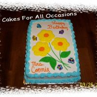 Spring Flowers I made this cake for my son's first grade teachers birthday today. She sure was surprised.Made with buttercream icing cookie cutter...