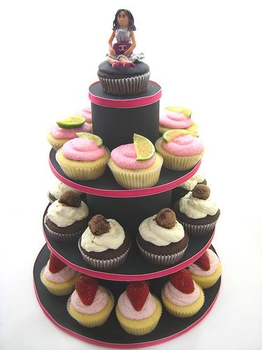 Cupcake Tower My First Cupcake tower... i even made the stand myself :) this is for my friend's birthday and it's got 3 different flavours -...