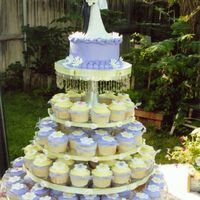 Wedding Cupcake Stand This is a wedding cupcake stand I did a while back. The tiers are glass rounds with crystal candlesticks as the columns between each layer...