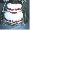 Family_Wedding_Cake.jpg Husband said do it as gift for a family member. Then I had to order cake stand... Husband never voluntered a free cake again... LOL