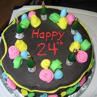 Champagne Birthday This was my first time working with chocolate/dark fondant as you can probably tell. I was kinda sloppy when 'pasting' the...