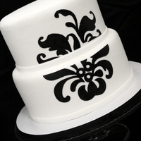 Flower Applique Buttercream icing with a fondant flower applique. Because I was trying to cover up my sps plate and cake board I had to make the boarder so...