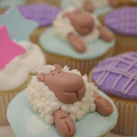 Lamb Themed Baptisim I made these cupcakes at a customers request to match the plates being used at the baptisim. White chocolate cupcakes with buttercream...