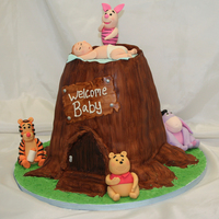 Trunk Cake The trunk is all cake covered in fondant, animals and baby are gum paste. I made this for a great friend, she loved it :)