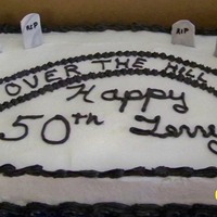 Over The Hill Chocolate Fudge Cake w/bc frosting and fondant headstones.