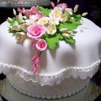 Embroidered Fondant Wedding Cake This one 10" cake of three identical cakes was covered in buttercream. I then rolled fondant out to 16" round and covered the...