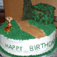 Robs_Bday_Cake__Dogs_013.jpg I made this cake for a very good friend of mine that loves hunting. The hut is made with grahm crackers & the tree is made with an ice...