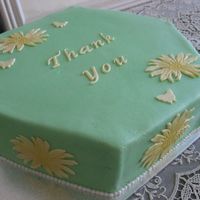 Thank You A quick cake for a woman who watched my kids while I got to go to my cake decorating classes. BC with gumpaste accents.
