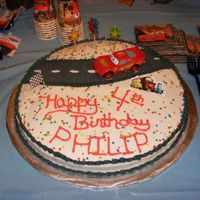 Lightening Mcqueen I had never used fondant before.....and only used it for the track. The rest is buttercream. Thank you for looking!!