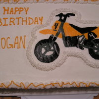 Dirtbike I had a request for an orange dirtbike for a friend's son's 4th birthday. This is what I came up with. They were happy with it so...