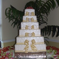 Wedding This cake was for a small wedding but she wanted a big cake. The bottom three tiers are dummies.