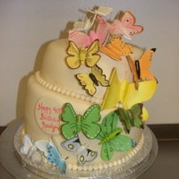 Butterflies All butterflies are handmade out of gum paste and hand painted. Lots of work.