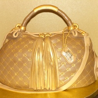 Gucci Purse All edible. Also made for latin singer Tito Nieves. His wife's b-day. Design done by hand.