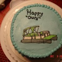 Pontoon Boat Birthday Cake Vanilla cake with chocolate pudding filling. All butter cream with fbct pontoon boat.