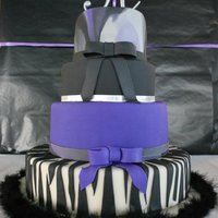 Sweet 16 Purple Black Silver This is a sweet 16 cake - two of the tiers are fake but I truly belive this is the best cake I have made - it just all went perfect.
