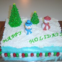 Mr. & Mrs. Snowman Oreo cookies and cream cake. Buttercream icing.