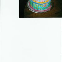 Tiered Birthday Cake This cake is all buttercream icing. I decorated it with lots of colors and swirls for my daughters first birthday.