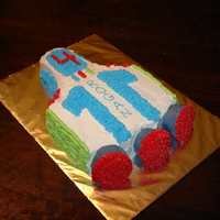 Buzz Lightyear Spaceship Cake My son wanted not a Buzz Lightyear cake but his ship. I used the vintage Wilton space ship pan and modified it with Buzz's colors and...