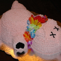 Luau Roasted Pig Cake For a Luau themed couples wedding shower. The cake body is two different sized pyrex bowls with a Wilton flower nail in the bottom to...