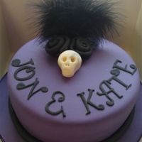 Skulls And Roses This cake is for an engagement party, the brief was to be gothicy and possibly skulls and roses