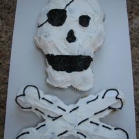 Pirate Skull & Crossbones Cupcake Cake For my son's school pirate party. Uses about 21 cupcakes.
