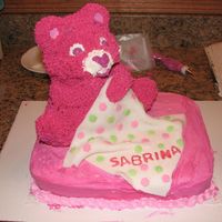 Care Bear Baby Shower Cake 3D cake for a Care Bear themed Baby shower. I used the Wilton 3D cake pan and fondant for the blanket.