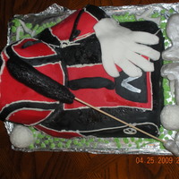 Golf Bag i use a 13x9 cake carved to size then a half ball is the front pocket, I used scraps of cake where i craved to make side pocket. I then...
