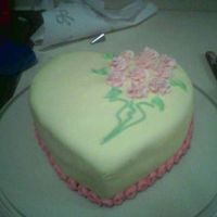 Heart Cake This is the first cake I ever made with fondant for a friend's birthday. I made my own fondant from a recipe I got on the food network...