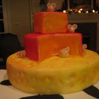 Mice And Cheese I did this for theOrange County fair for the theme "Just Say Cheese", Cake covered in fondant and mice are gumpaste