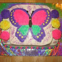 Butterfly Cake Made for a coworker, Her daughter's 1st b-day- butterfly theme. Image is FBCT, and cake is 2 layers with mini cupcakes on the side.
