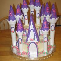 Princess Castle PRINCESS CASTLE CAKE FOR MY 1YR OLD SWEETIE! I USED THE ROMANTIC CASTLE FROM WILTON (CAME WITH PILLARS/WINDOWS/DOOR)