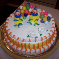 Clowns I'm not happy with my clown cake but I had a lot of fun making it. The only thing I like about my cake is the roses that I put on...