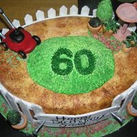 Lawn Mower Theme My customer called me 5 days before she required this cake and wanted a rather large sculpted lawn mower cake. ...ahh...not gonna happen!!...