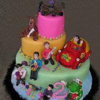 Wiggles Cake wiggles cake for my DD's 2nd birthday...unfortunately it got thrown together at the last minute as I had a really big wedding cake...