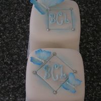 3Inch Wedding Cakes/bonbonaires I had to make 100 of each (200 in total...300 butterflies arrrrrgh!) of these cakes for bonbonaires. orignally the bride wanted 2inch sq...