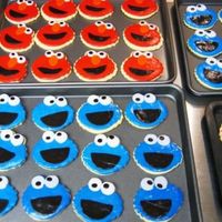 Elmo And Cookie Monster Cookies I made these for my cousins baby's 1st bday as favors. NFSC and rolled buttercream. I also flavored the cookies and icing with lemon....