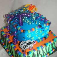 Zebra Stripes This was a jungle themed cake for a little boy's first birthday. It is iced in all buttercream and the zebra stripes are done in royal...