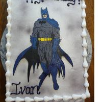Batman Here's a cake I made for a friends son. Batman is a fbct