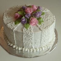 Roses! Birthday cake for my best friend. She loved it! I need more practice on the cornelli lace, but not bad for a first try. Also first time...