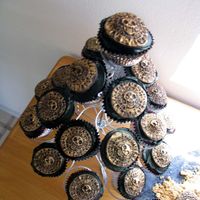 Pirate Coin Cupcakes Aztec Gold coin made out of chocolate fondant on cupcakes