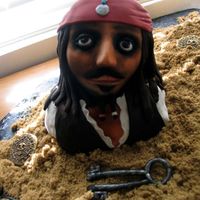 Jack Sparrow Used lots of rice crispies on his head, covered that with fondant, sculpted eye sockets, nose, mouth, and cheeks by hand. Wanted to give...