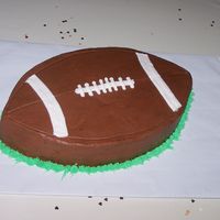 Groom's Cake Cut this football out of a 12" square chocolate cake. Iced with chocolate buttercream.