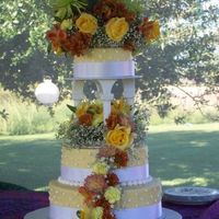 Early Fall Wedding Cake Collaboration with MIL. She baked the cakes and did the flowers. I did all of the icing work. 6", 9" & 12" Italian Cream...