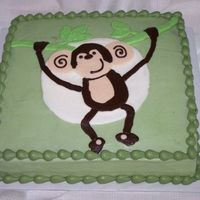 Monkey 12" square marble cake decorated with buttercream to match the baby's nursery theme. Enjoy!