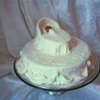 God Bless Baby This was a baby dedication cake. I used fondant purchased from a local bakery. It tasted better than the boxed fondant I'd purchased...