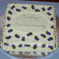 Anniversary Cake With Violets And Cornelli Lace I like the color on this cake - the photo isn't really true to color. Violets are deep purple, and the green is soft. Cornelli Lace...
