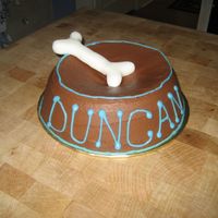 Dog Bowl Cake Made this for my neighbor's when they got a new puppy Duncan! Fondant bone and buttercream cake