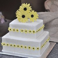 Sunflower Bridal Shower Vanilla Cake with Vanilla Buttercream. It has gumpaste sunflower details!