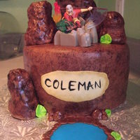 Avatar: The Last Airbender Made this cake for my son's 8th birthday. Cake covered in fondant and sponge painted with brown food coloring to give it dimension....